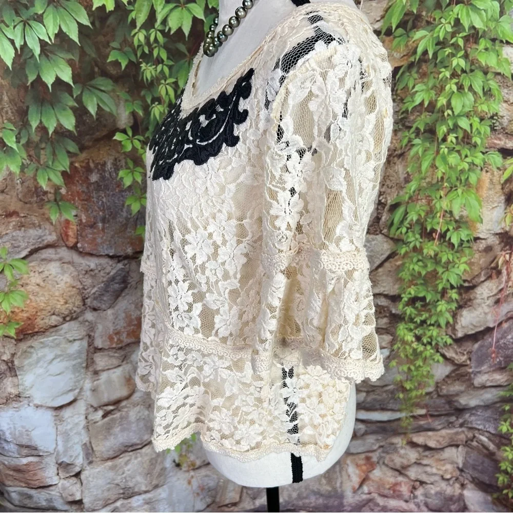 FREE PEOPLE Cottagecore Cream Peplum Blouse with Black Lace Ruffles, M
